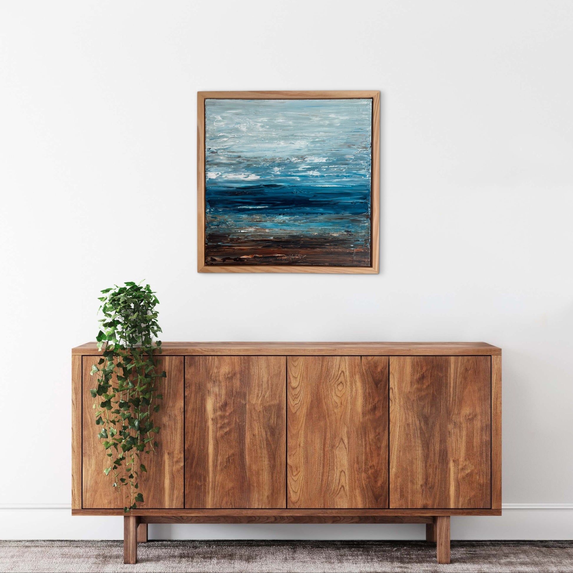 Deep Blue Horizon – Ocean & Earth VIII displayed in a warm neutral interior with natural styling