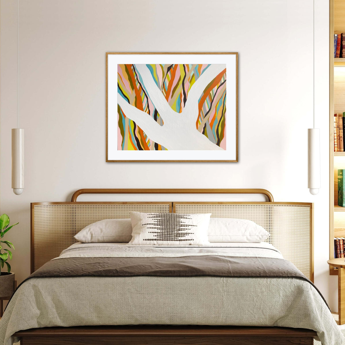 Brilliant Blue Gum framed print displayed above a bed in a neutral bedroom