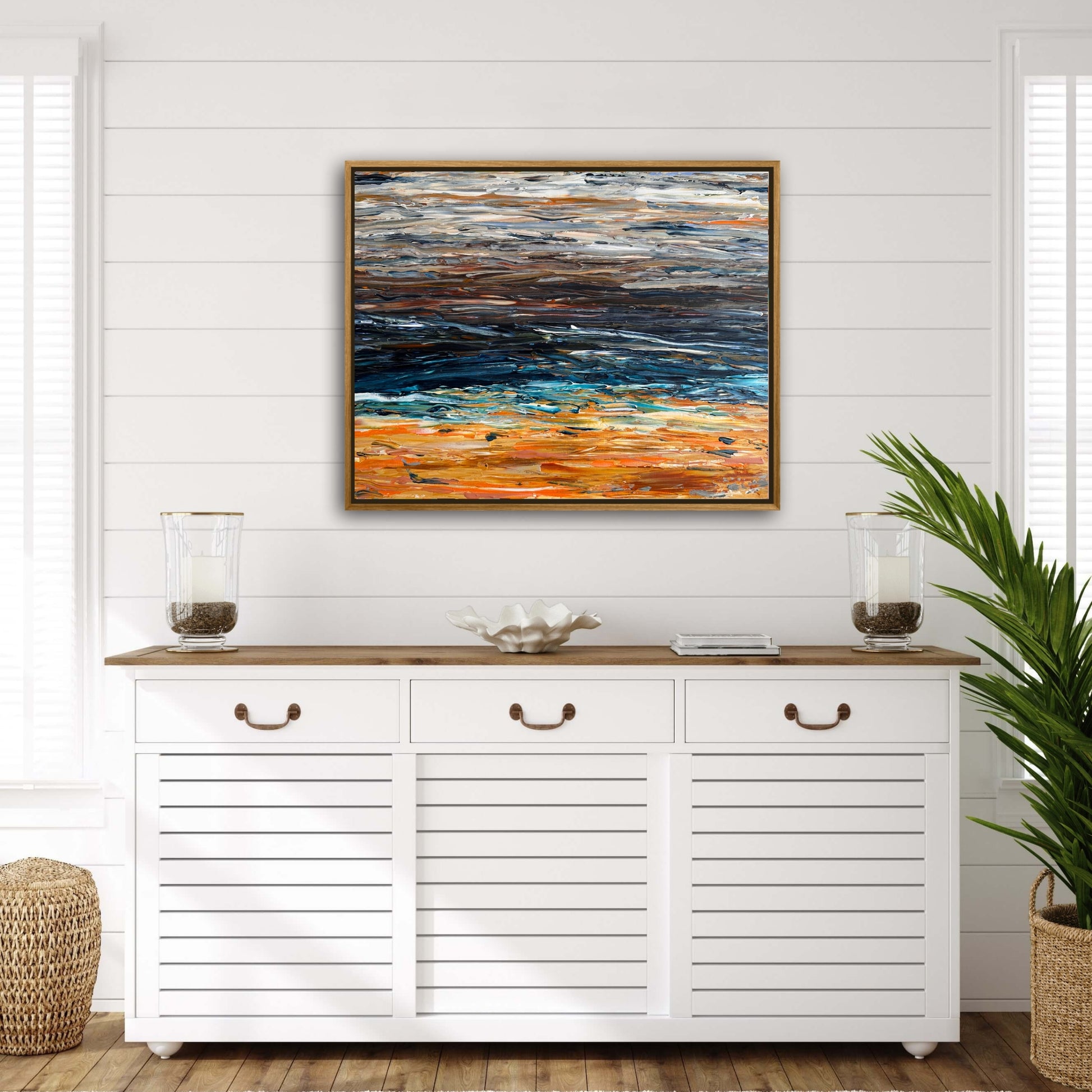 Prussian Sea Sienna Sands I abstract artwork displayed above a white console in a coastal interior