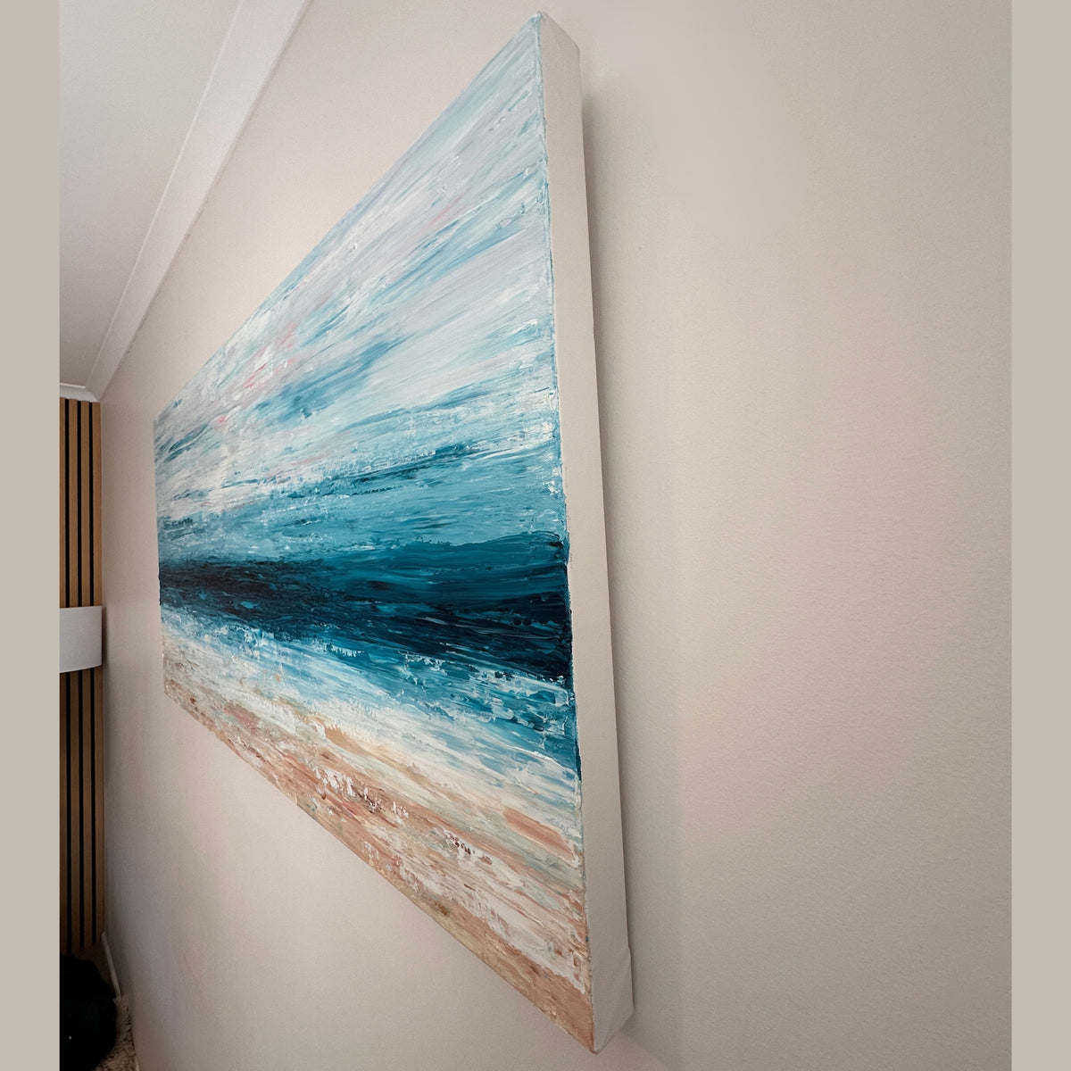 Side view showing the layered texture and depth of Spring Tide ocean painting